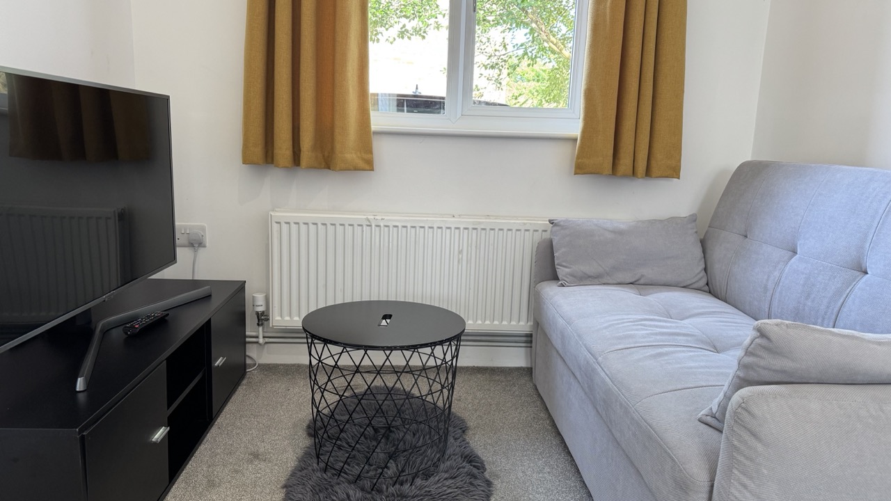 Comfortable bedroom with quality linens near Gatwick Airport